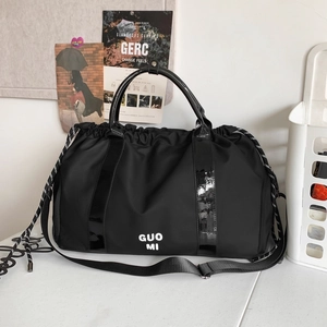 Sac de voyage imperméable en oxford noir avec cordon de serrage et grande capacité