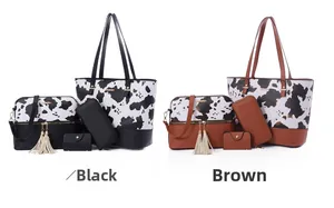 Vue détaillée de l'ensemble de 4 sacs à main avec motifs de vache en noir et marron