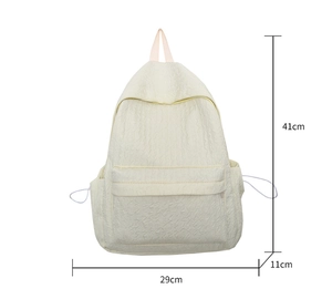 Vue détaillée des dimensions 41x29x11cm pour le sac à dos minimaliste de couleur beige