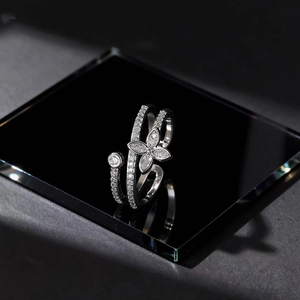Silver multilayer open ring featuring a sparkling zircon butterfly design on a black surface