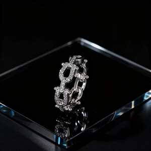 Silver chain style ring with pavé zircons in a minimalist geometric industrial design