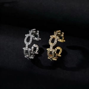 Industrial style chain drop earrings with micro-pave crystals in gold and silver finish