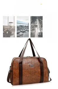 Dettaglio texture coccodrillo marrone scuro su borsa da viaggio capiente in pelle PU
