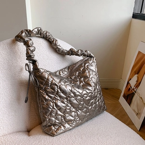 Metallic silver hobo bag with heart quilted pattern and ruched shoulder strap for women
