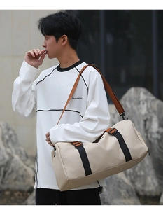 Close-up of beige Oxford tote bag with dual shoulder straps and a spacious gym design
