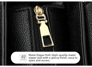 Detail of premium black lychee leather bag featuring a polished gold metal zipper puller