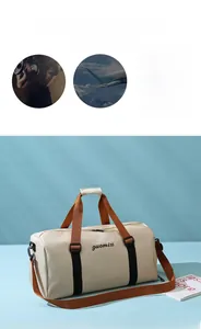 Close-up of beige waterproof gym bag featuring orange handles and adjustable straps