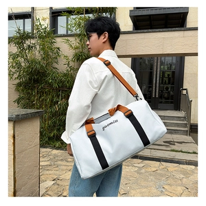 Large Oxford travel tote bag for gym shown on model featuring separate shoe compartment