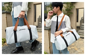 Detail view of large Oxford travel tote bag with durable handles and logo embroidery