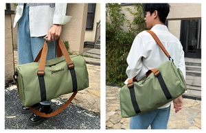 Olive green travel tote bag detail showing dual carry handles and adjustable shoulder strap