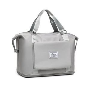 Bolso deportivo gris claro de gran capacidad con asas reforzadas y tejido de nailon