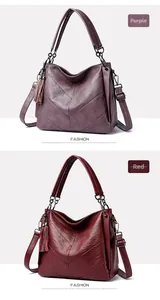 Detail of purple and red bags with V-stitching patterns and matching tassel charms