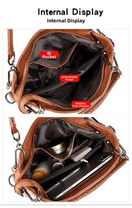 Internal display of large capacity shoulder bag showing functional compartments and pockets