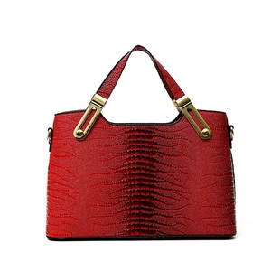 Deep red and black gradient embossed crocodile pattern tote bag with gold metal accents