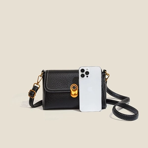 Retro black leather crossbody bag with lychee texture and gold clasp detail
