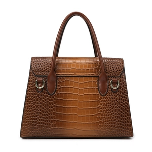Brown crocodile embossed leather handbag with top handles and gold hardware details
