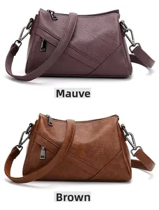 Gros plan de sacs bandoulière multi-fermetures en rose gris et marron en cuir PU
