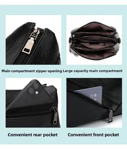 Vue détaillée du sac bandoulière en cuir noir avec plusieurs compartiments internes