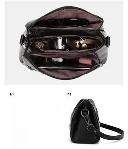 Vue détaillée de l'intérieur multi-compartiments d'un sac à bandoulière en cuir PU