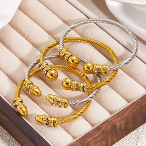 Luxurious twisted rope bangles with sparkling rhinestones in gold and silver set