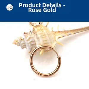 Detail view of the polished rose gold stainless steel hoop earring with seashell decoration