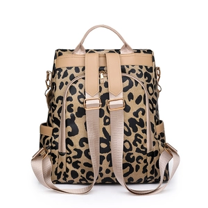 Women's leopard print backpack with khaki trim, anti-theft design and gold hardware