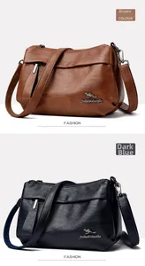 Gros plan de sacs à bandoulière marron et bleu foncé en cuir PU grainé avec logo kangourou