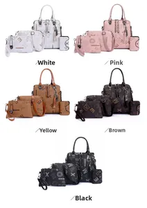 Detail view of four-piece printed tote bag set with tassel charms in five colors