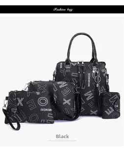 Black four-piece handbag set with white letter patterns including tote and crossbody bag