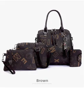 Detailed close-up of 4-piece brown tote bag set with textured leather and gold chain