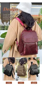 Detail showing the vintage texture and functional zippers of the large women's backpack