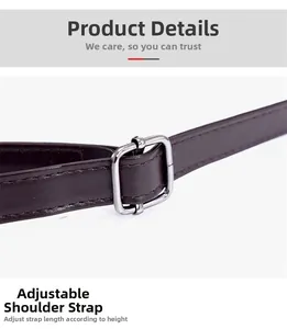 Macro detail of adjustable brown leather shoulder strap with silver buckle and neat stitching