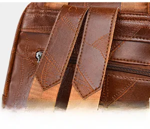 Macro view of high-quality stitching and vintage brown leather texture on backpack
