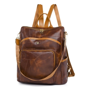 Brown patchwork faux leather backpack for women with spacious compartments and golden zippers