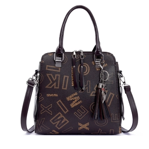 Brown leather tote bag with letter prints, detachable shoulder strap and cat pendant charm