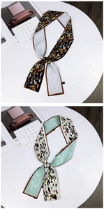 Detail of artistic double-sided narrow silk scarves with premium stitching and patterns