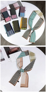 Detail showing various printed silk twilly scarves with dots, stripes and vintage patterns