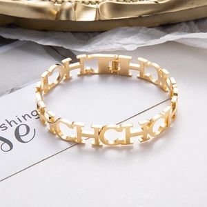 Polished gold stainless steel CH letter hollow spring bracelet for women