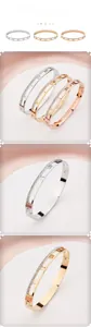 Detailed set of three roman numeral hollow bracelets in silver gold and rose gold finishes