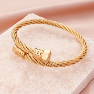 Gold-plated stainless steel cable wire bracelet with industrial hexagonal nut ends