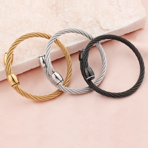 Three-color cable wire bracelets set in gold, silver and black stainless steel