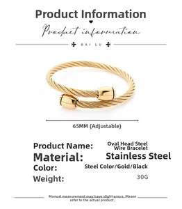 Detail view of gold stainless steel cable bracelet showing 65mm adjustable size and 30g weight