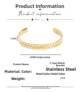 Detail of 10mm wide gold stainless steel C-shaped cuff bracelet with wheat ear texture