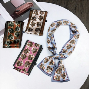 Chic long animal tiger print twilly scarves in four colors on elegant marble base