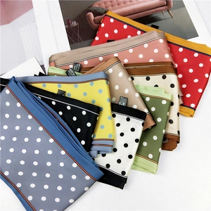 Various polka dot silk-feel scarves in multiple colors for stylish hair and neck accessories