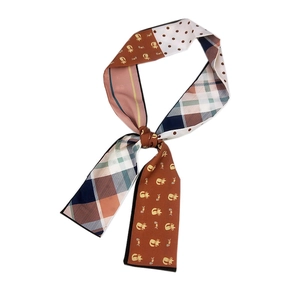 Polka dot and cat print silk-like skinny scarf in caramel brown and navy blue tones