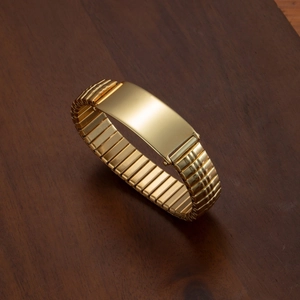 Polished gold stainless steel expandable strap bracelet with a rectangular ID plate
