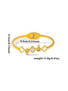 Detail view of a gold clover open bangle showing 6.4cm inner diameter and 0.3cm width