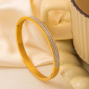 Luxurious gold titanium steel bracelet with triple rows of zircon stones and matte finish