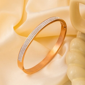 Elegant rose gold titanium steel bracelet with three rows of shimmering cubic zirconia